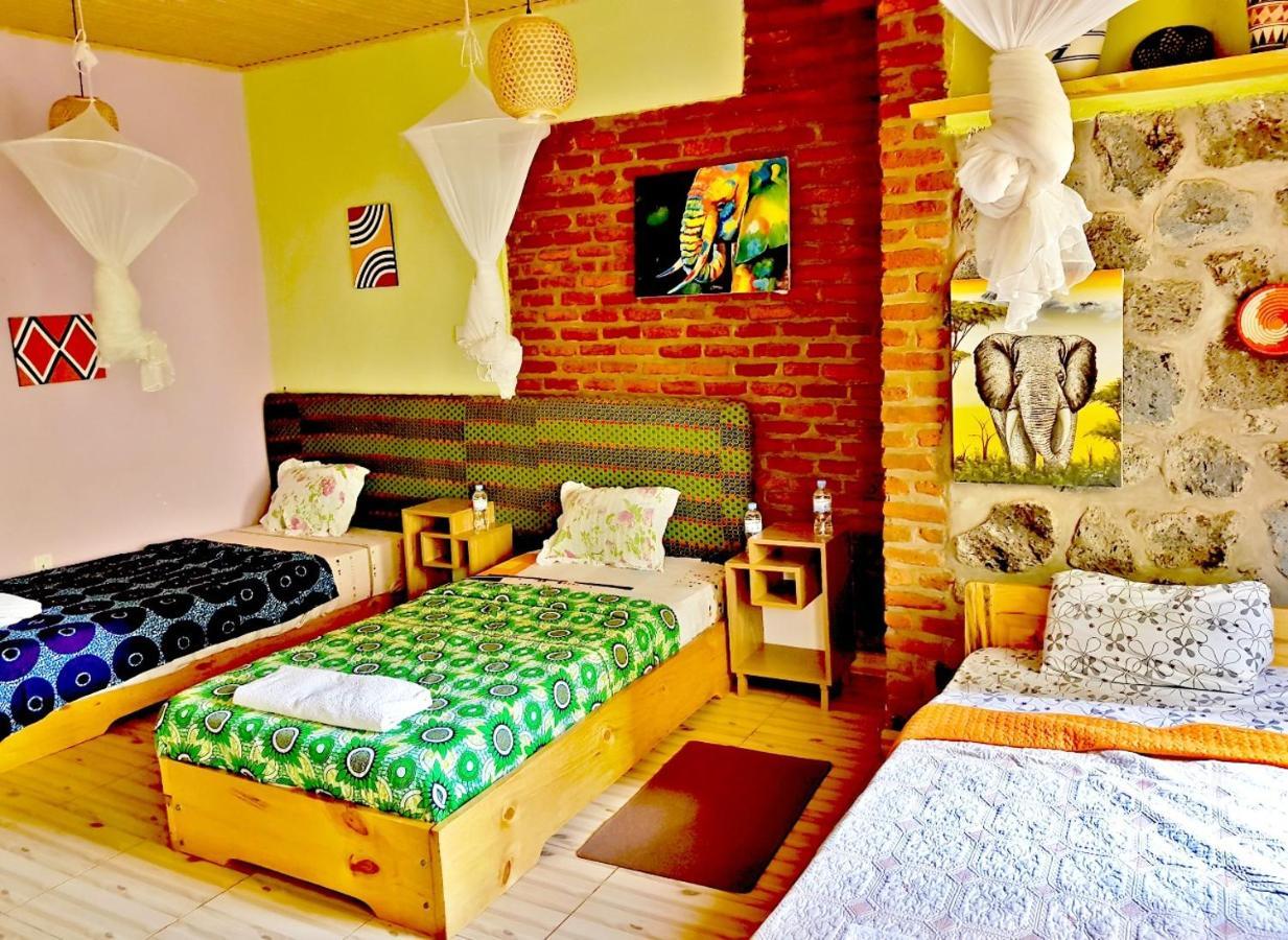 Yambi Guesthouse Кигали Экстерьер фото